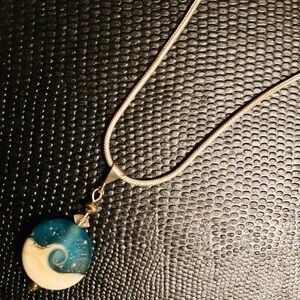 Elegant Blue and Gold Wave Pendant Necklace